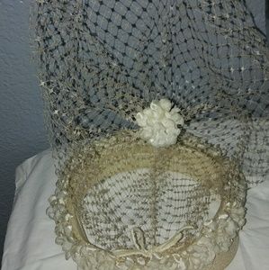 Vintage cream fascionator hat